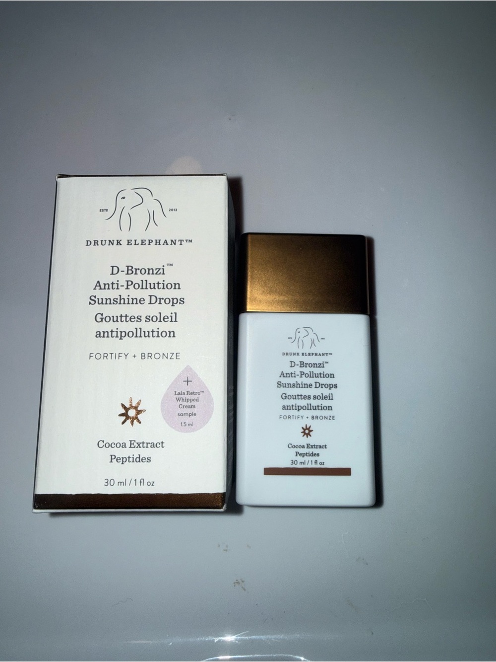 Drunk Elephant D-Bronzi Anti-Pollution Sunshine Drops - Bronze & White